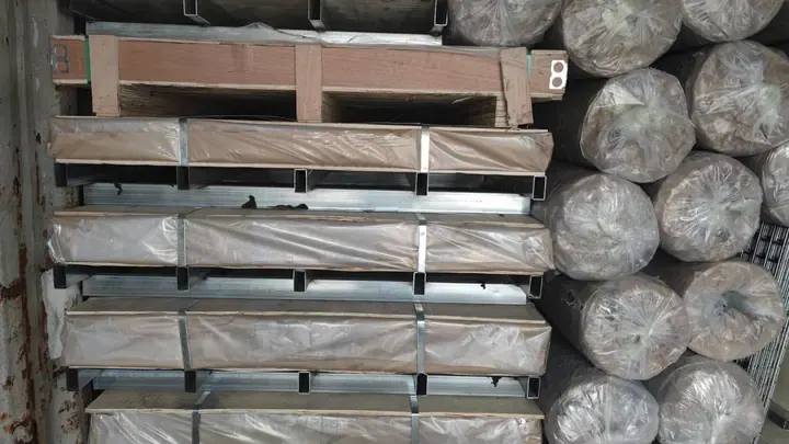 Packed expanded metal sheet and roll orders loaded for export delivery