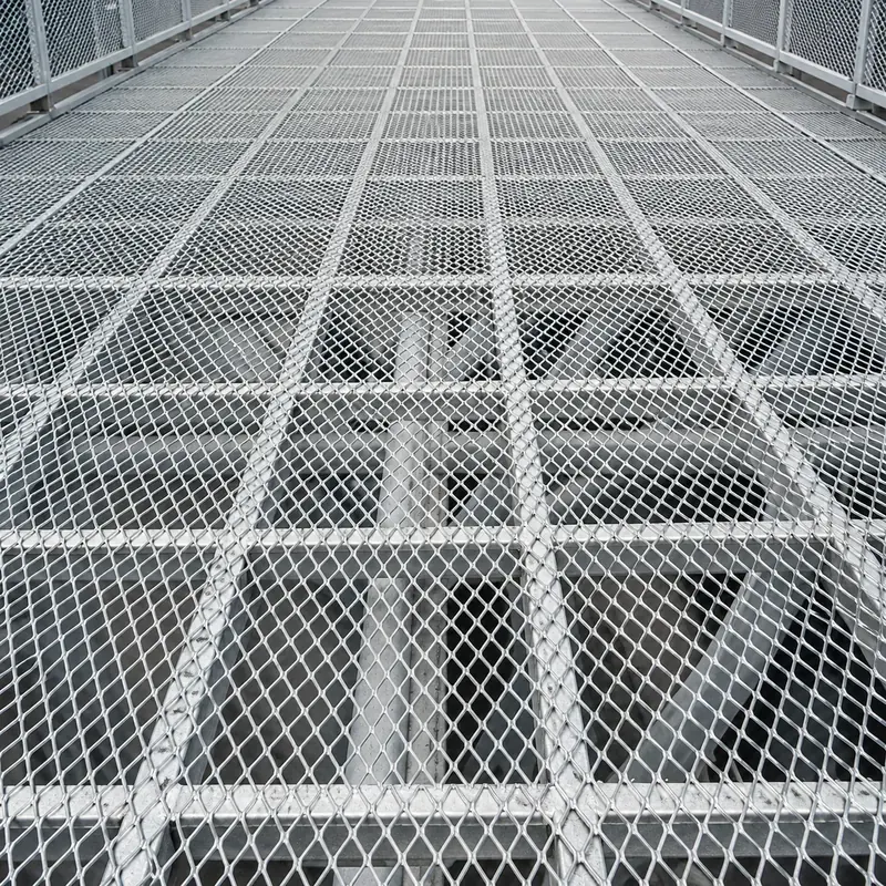 Galvanized expanded metal flooring panels on an industrial elevated platform