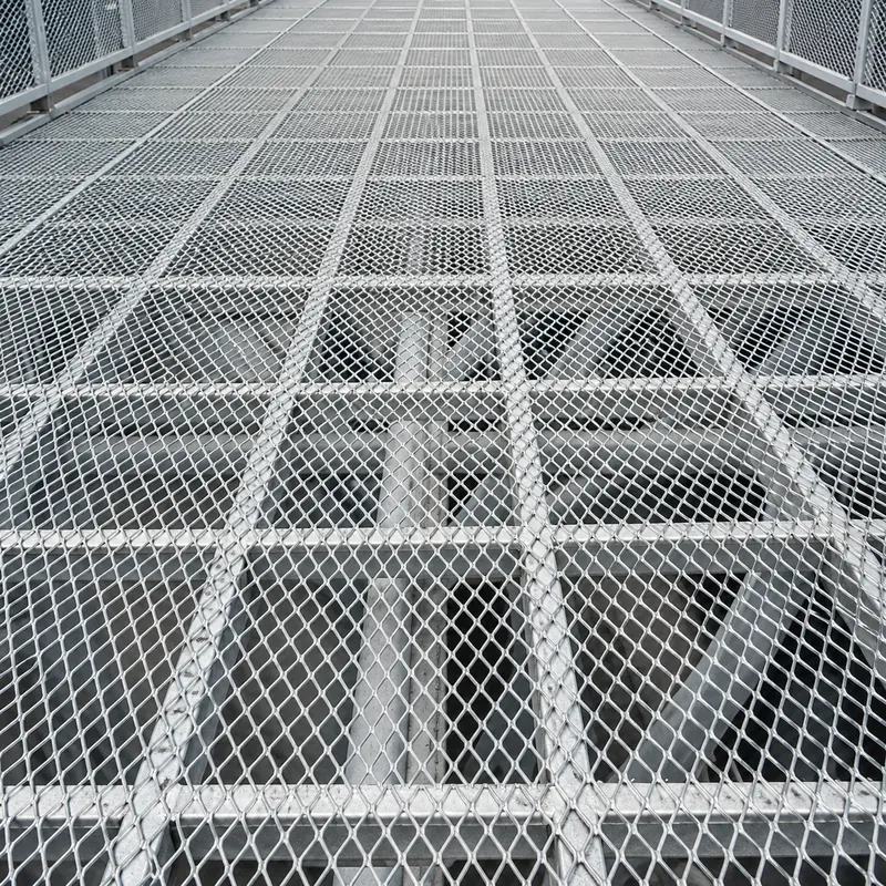 Galvanized expanded metal flooring panels on an industrial elevated platform