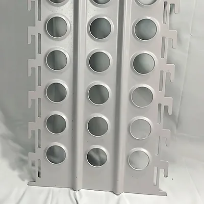 Stainless steel perforated metal sheet edge and surface detail