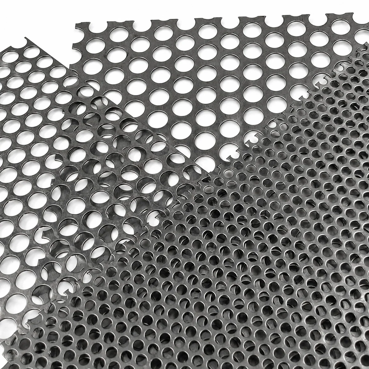 Carbon steel perforated sheet samples with mixed round hole sizes