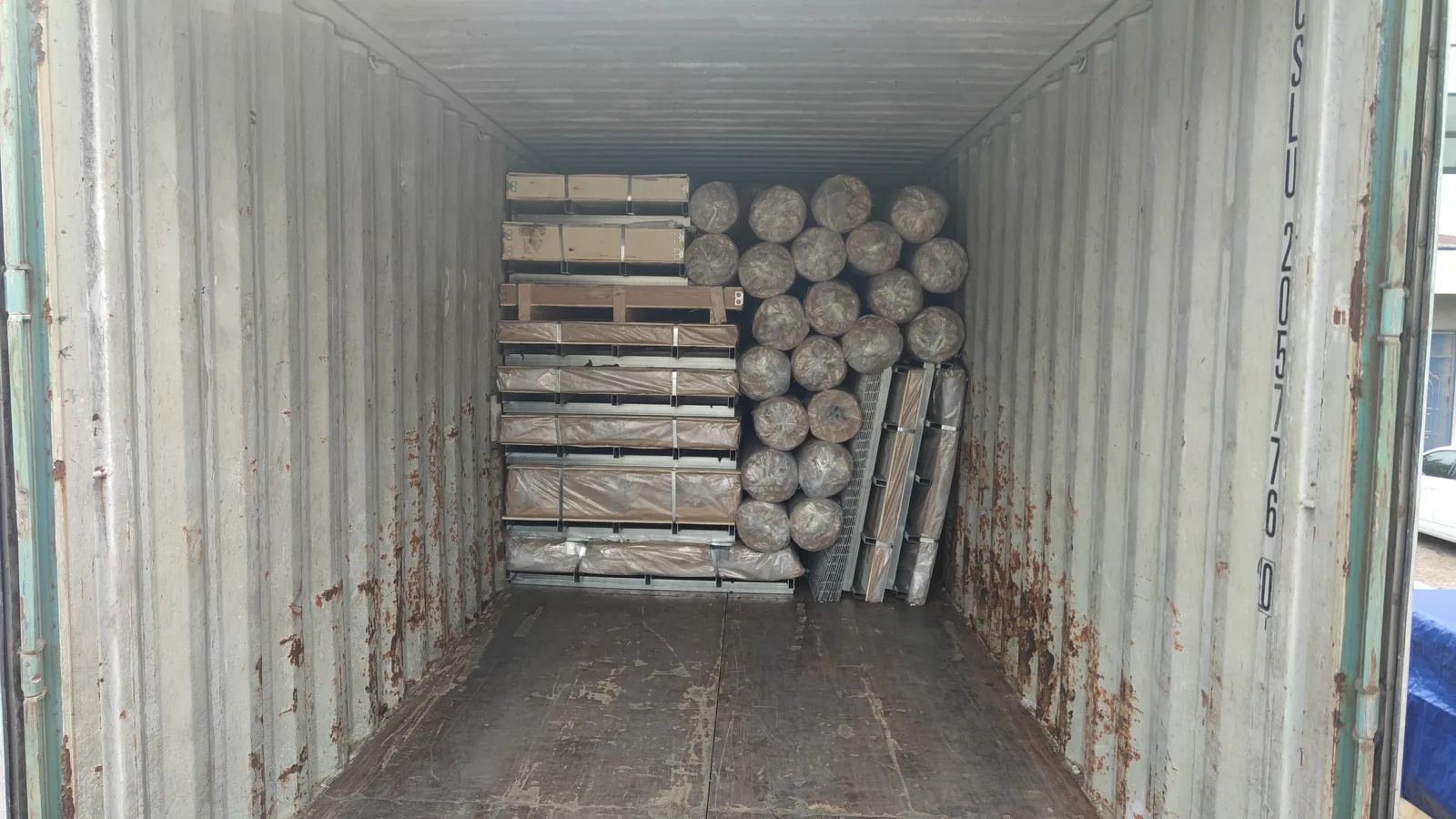 Expanded metal bundles loaded inside a shipping container