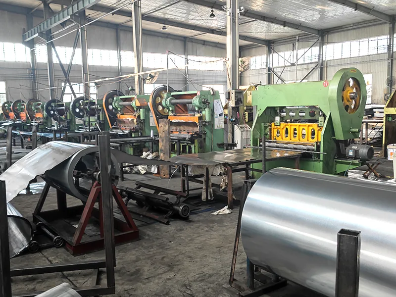 Expanded metal production machines and finished rolls inside the YueChu Metal factory