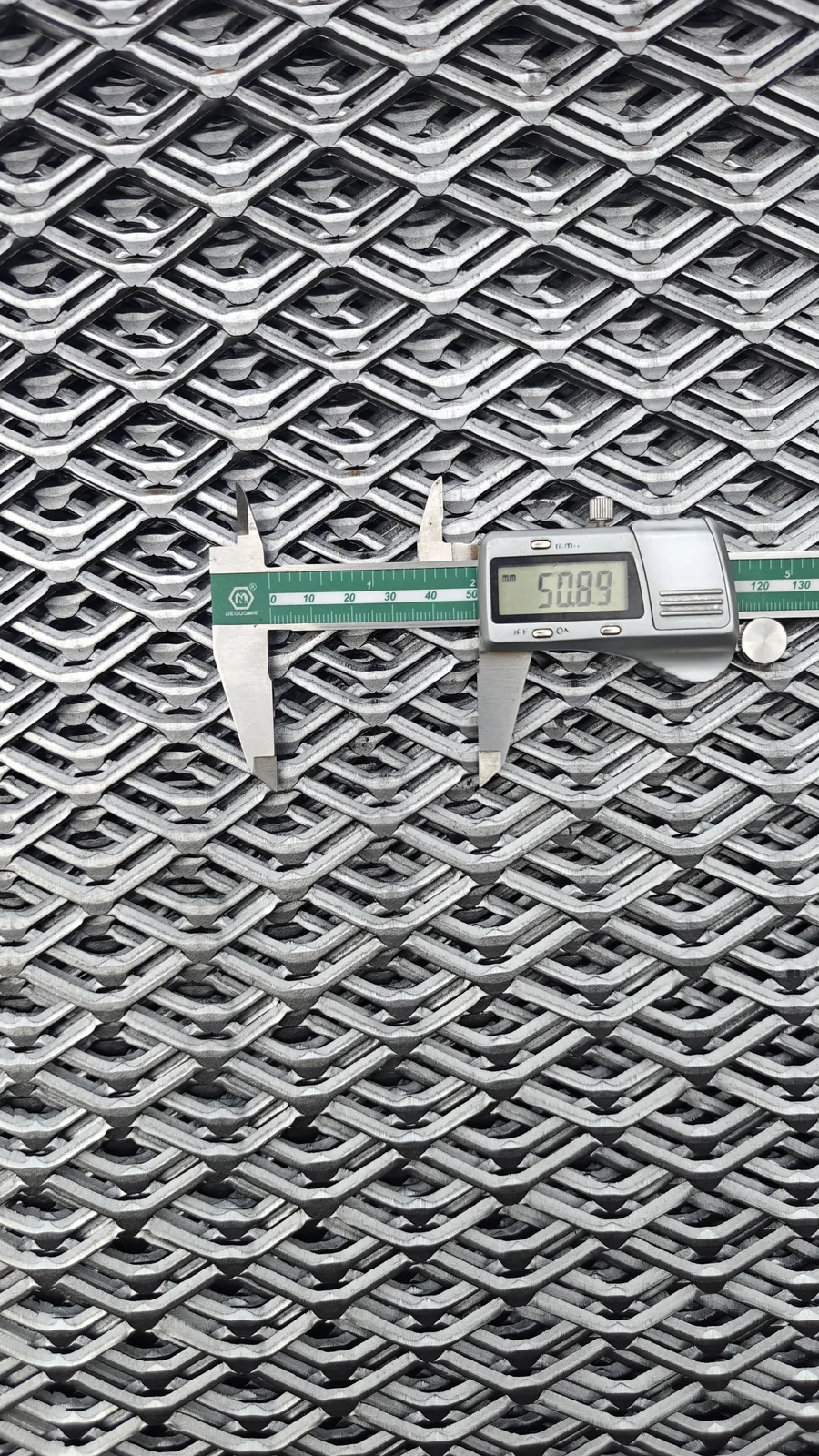 Digital caliper checking expanded metal mesh opening dimensions