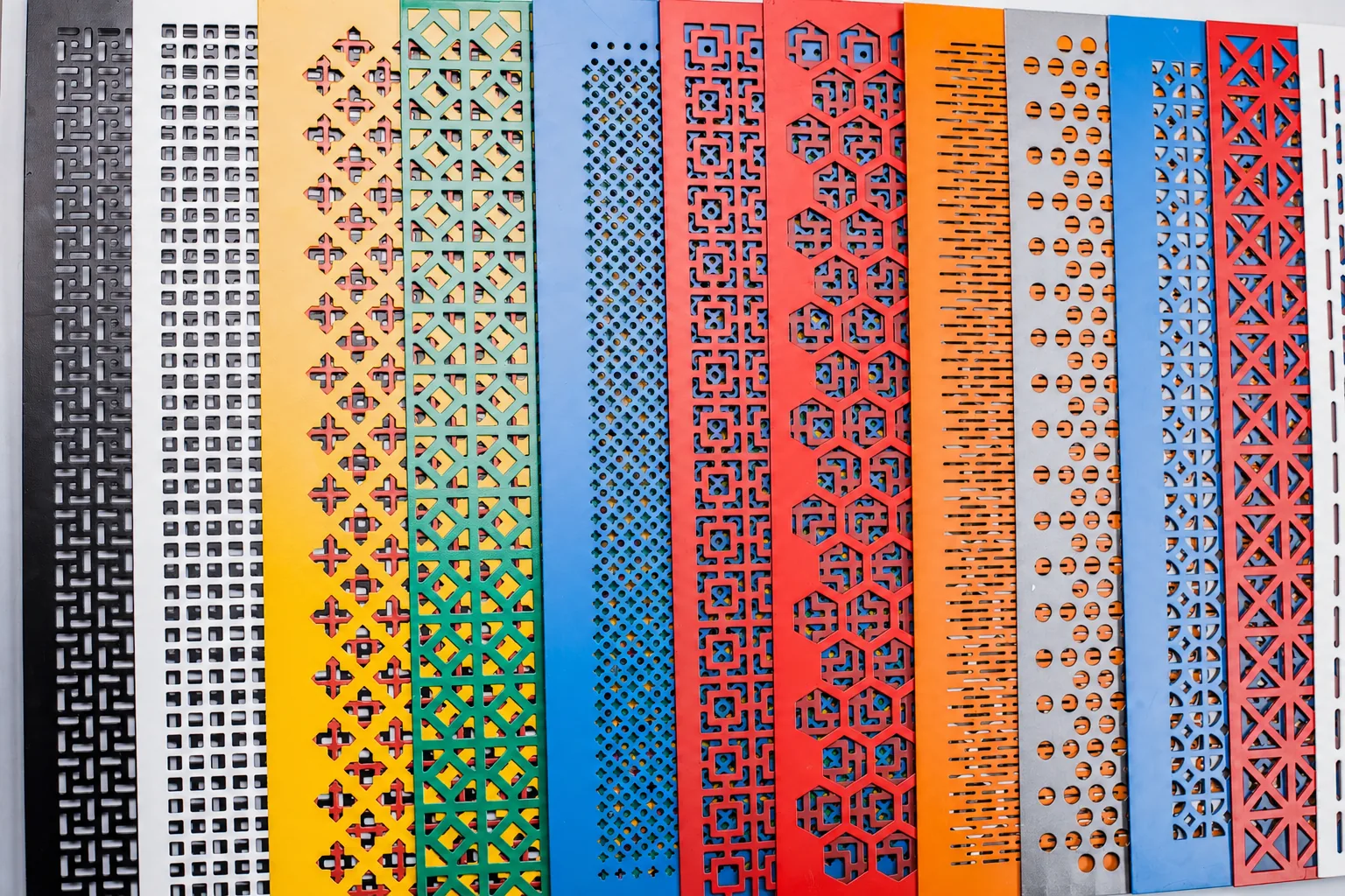 Decorative aluminium perforated metal panels in custom colours and geometric hole patterns