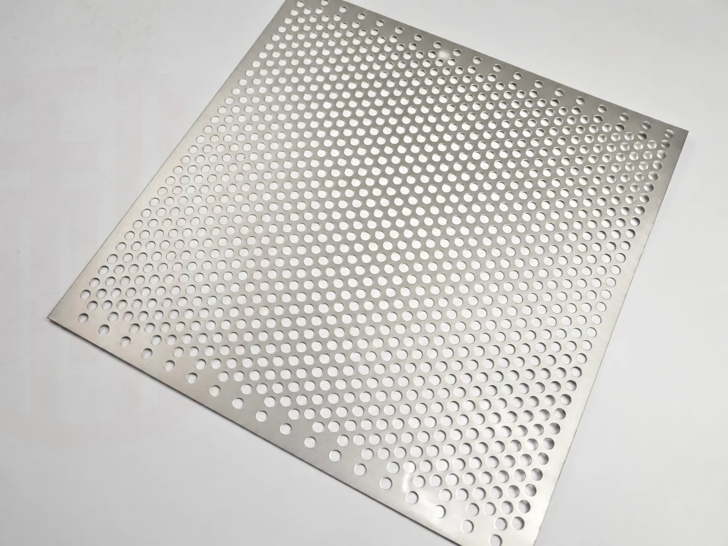 Flat nickel perforated sheet panel with round holes