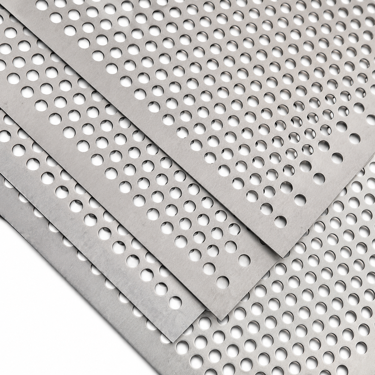 Stacked titanium perforated sheet panels with round holes