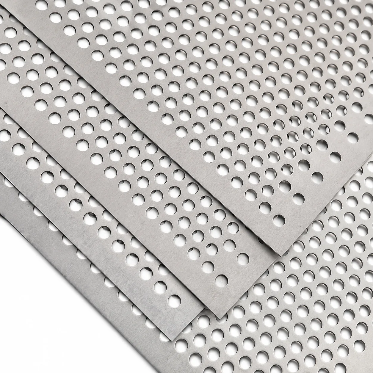 Stacked titanium perforated sheet panels with round holes