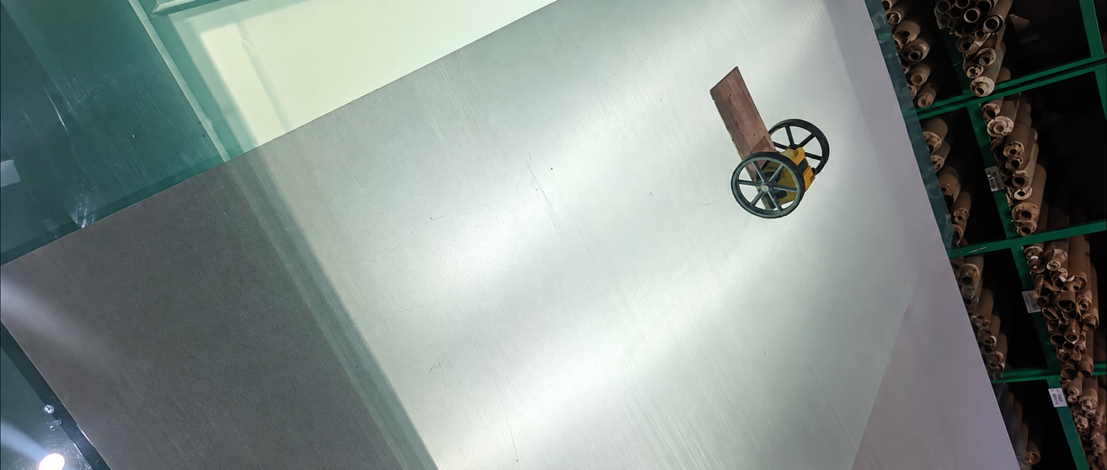 304 stainless steel fine wire mesh sheet opened on a factory inspection table